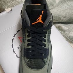 Air Jordan 4 Undefeated Deep Green 