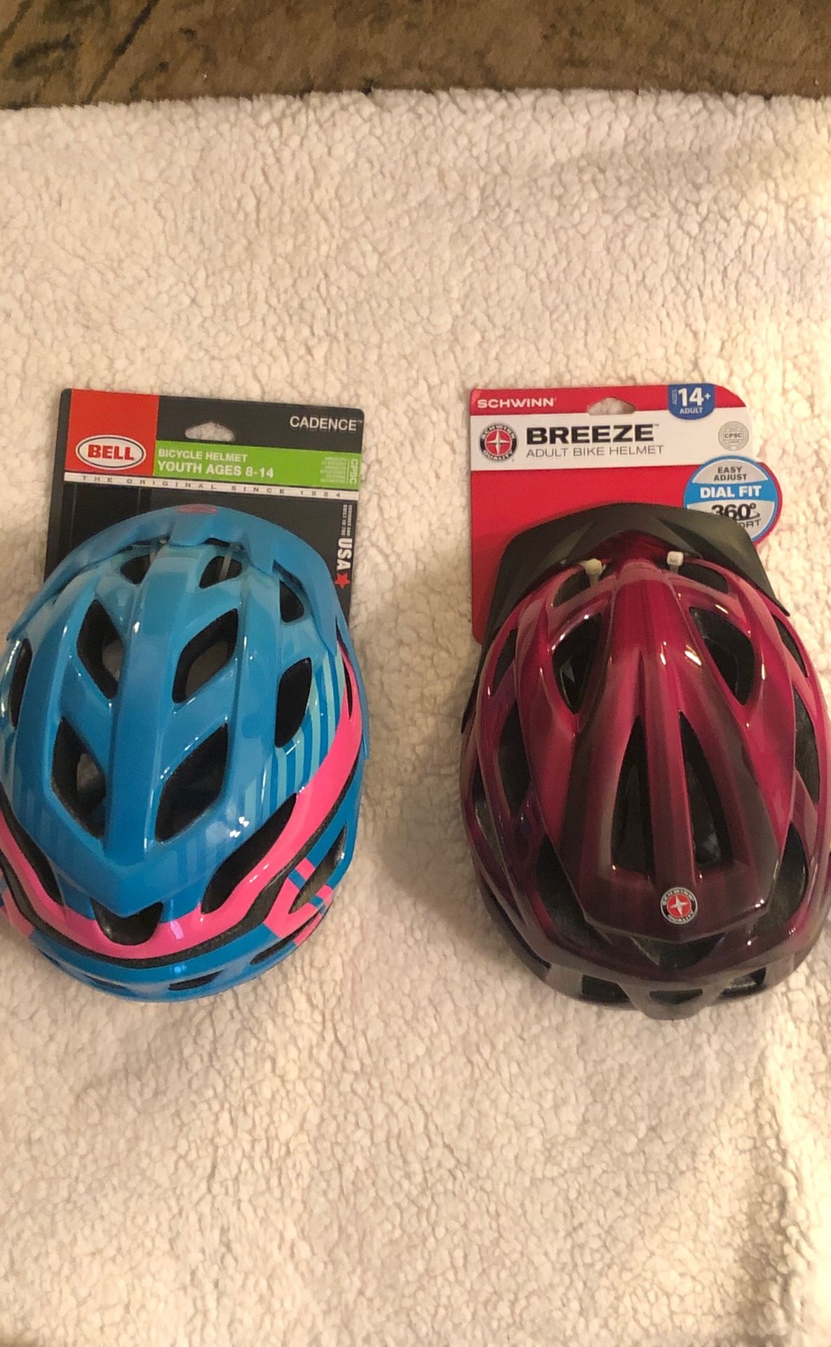 1: Bell Cadence Bicycle helmet ages 8-14 is the blue one. The other is a Breeze adult helmet ages 14 and up.
