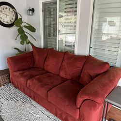 Selling 2 Red couches