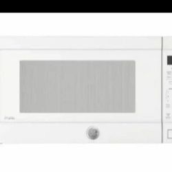 MICROWAVE OVEN/ FOUR À MICRO-ONDES/ HORNO MICROONDAS  SIDE / CÔTÉ/LADO  MAX CLAMP PRESSURE = 1700 lbs.  BULK CLAMPING ONLY Product Dimensions:  14"H x