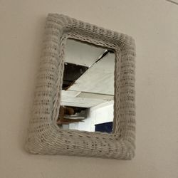 White vintage wicker mirror 