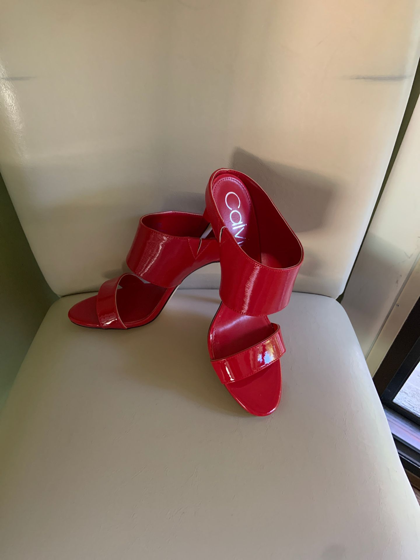 Gorgeous red Calvin Klein heels, Never worn. Size 9.5