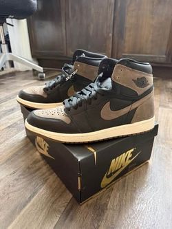 Black and brown high top Jordan’s