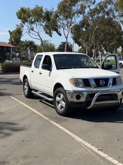 2007 Nissan frontier 136k miles v6 4.0 Liter 4 doors short bed