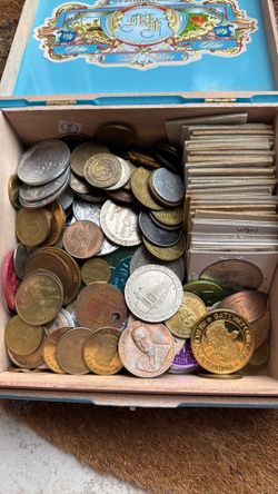 Box of vintage tokens and such