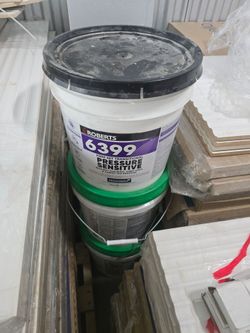 2 New Unopened Roberts 6399 Pressure Sensitive Flooring Adhesive – 4 Gallon Buckets