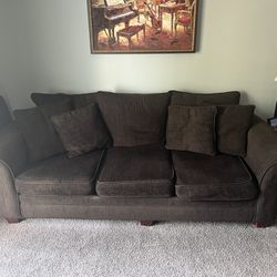 3 seat sofa with pillows 