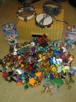 Over 120 skylanders- crystals and mini skylanders- 3 games and portals all work great.