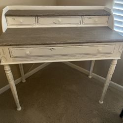 Decorative Desk and Wicker Chair 