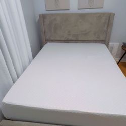Queen size Bed frame and mattress.