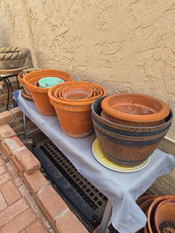 Variety of ceramic and terracotta planter pots