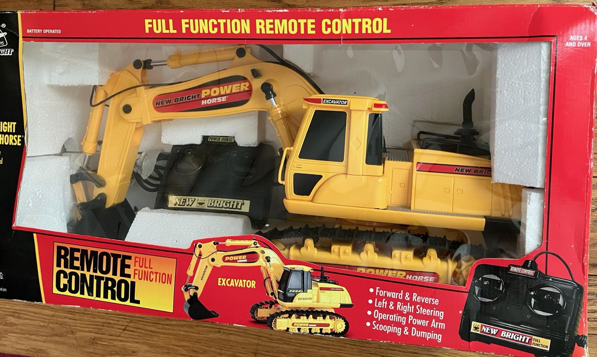 NEW IN BOX VINTAGE EXCAVATOR WITH REMOTE