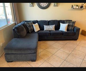 Beautiful charcoal grey sectional couch from Ashley furniture