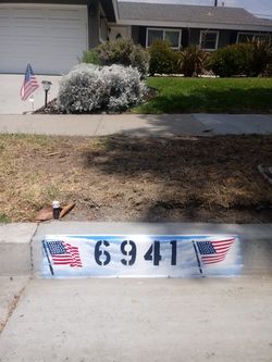Hand painted curb dezign for your home address.