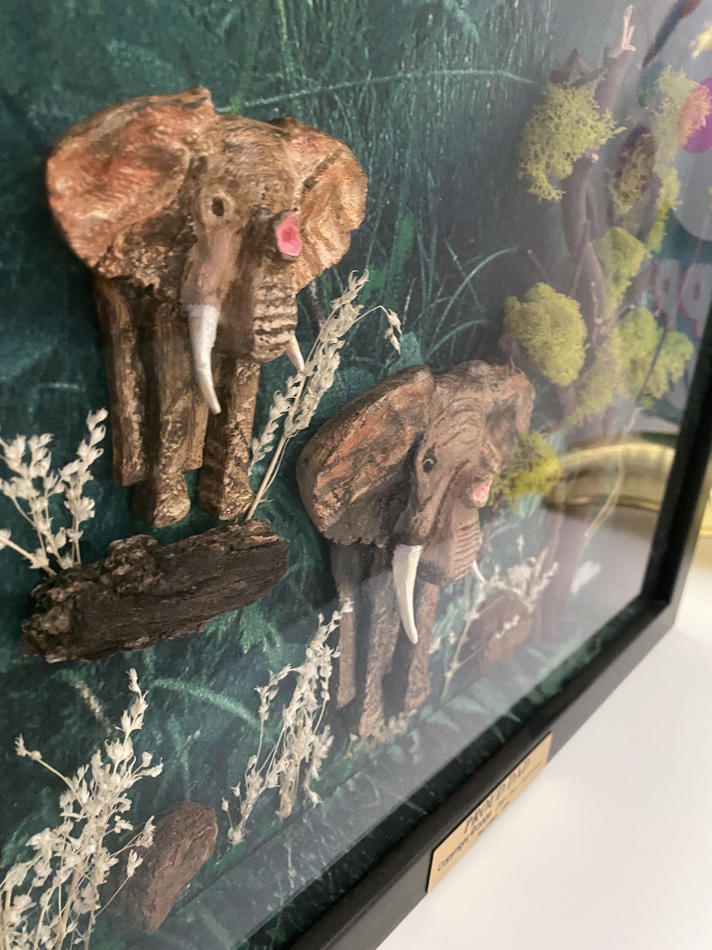Very unique 1 of a kind 3-D effect beautiful hand sculpted and hand painted mother and baby elephant enclosed in a very expensive shadow box. Set in