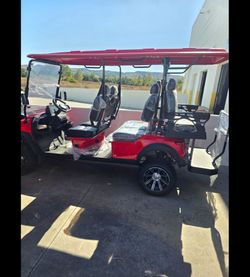 BRAND NEW GOLF CART RED BLACK INTERIOR SOUND BAR 6 seater LITHIUM ION BATTERIE