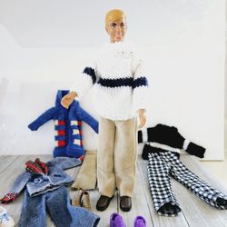 Vintage 1968 Blonde 11.5" Ken Doll by Mattel with Various Clothing Accessories and 9 Pairs of Shoes. Male Barbie Doll.

Pre-owned in excellent clean c