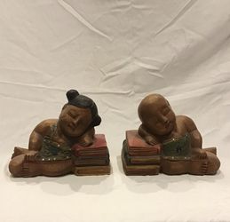 Vintage pair of Chinese bookends boy and girl wooden teak