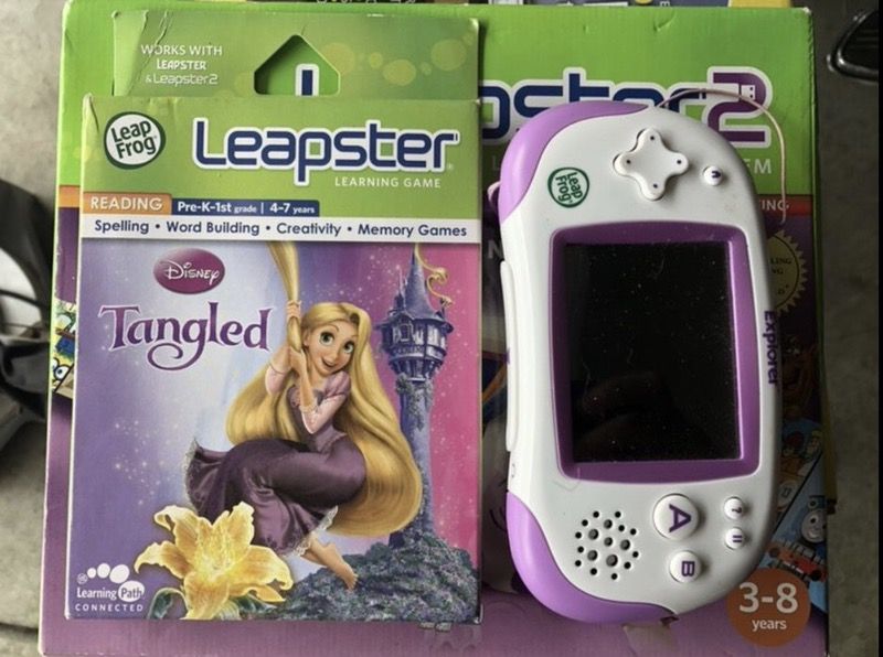 2 Leapster Learning Game Systems - 1 brand new & 1 used with brand new game as well