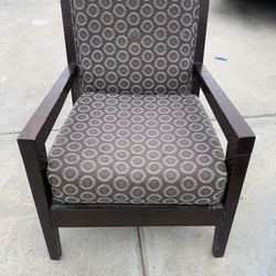 Cushioned, large arm chair