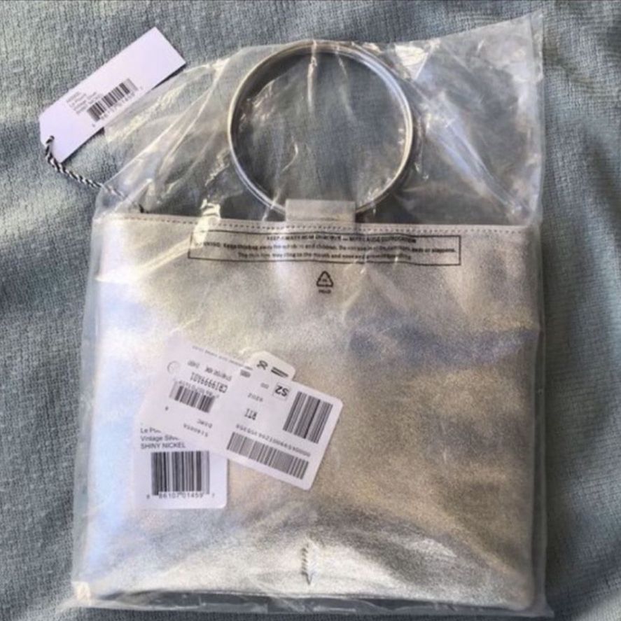125 OBO Paid 165 Silver Le Pouch Leather Ring Handle Crossbody Bag THACKER Price 148.00 Tax for Sale in Moreno Valley CA OfferUp