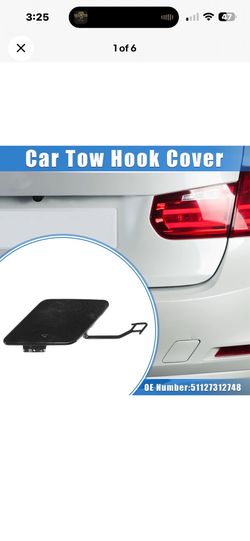 Rear bumper tow hook cover