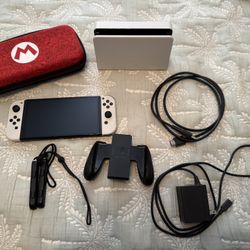 OLED Nintendo Switch Like New With Carrying Case