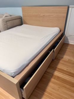 Full size bed with storage drawers