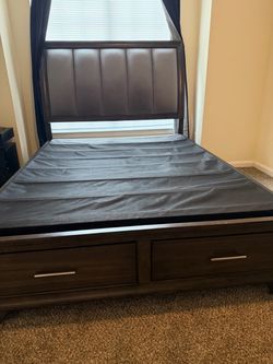 Grey bed frame with headboard