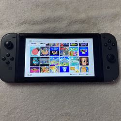 NINTENDO SWITCH V2 With 100 SWITCH GAMES