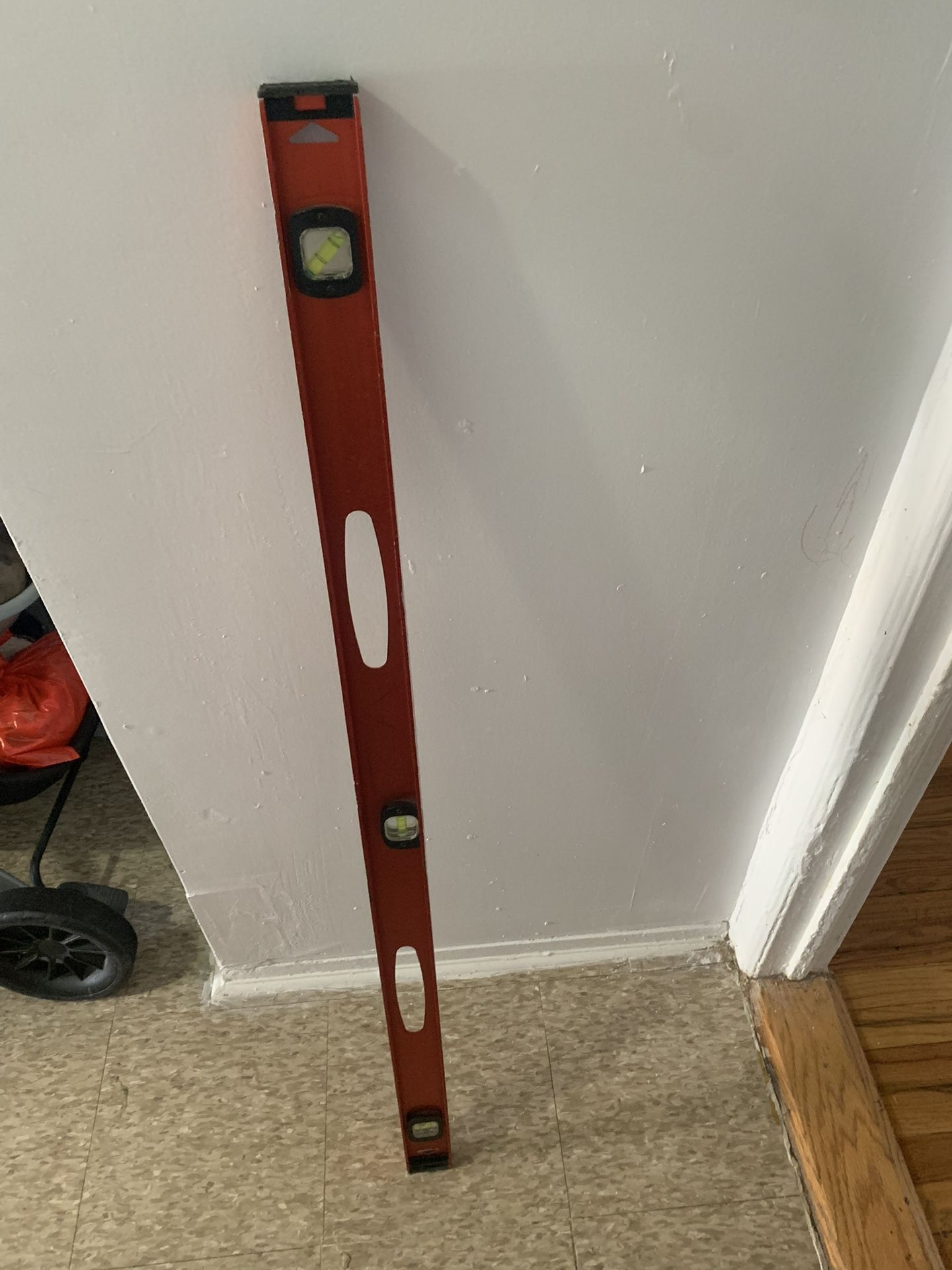Level and Makita drill