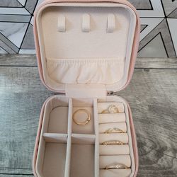 Pink Mini Jewelry Travel Case, and 5 gold tone Rings