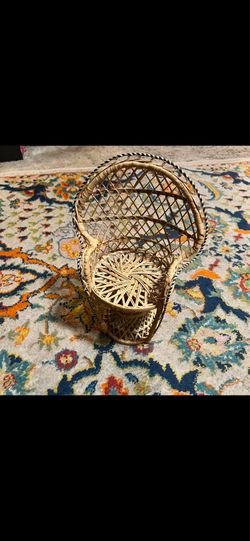 Small wicker peacock chair plant stand
