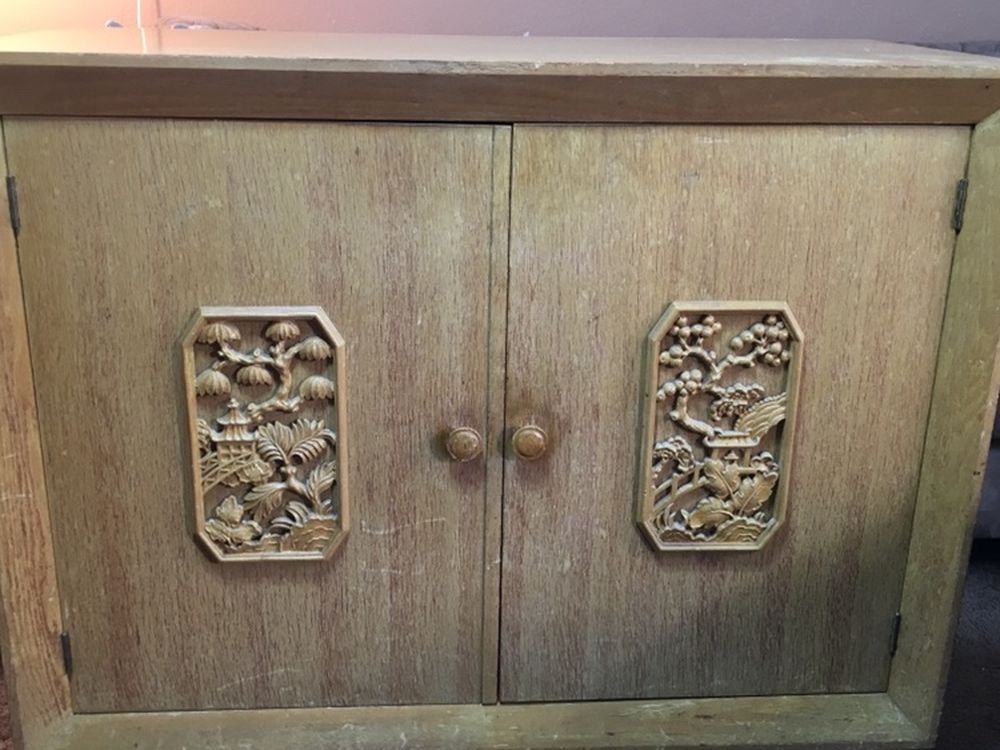 Vintage Chinese Cabinet Has engraved scenes on front of both drawers 38” long 17” wide 32” tall