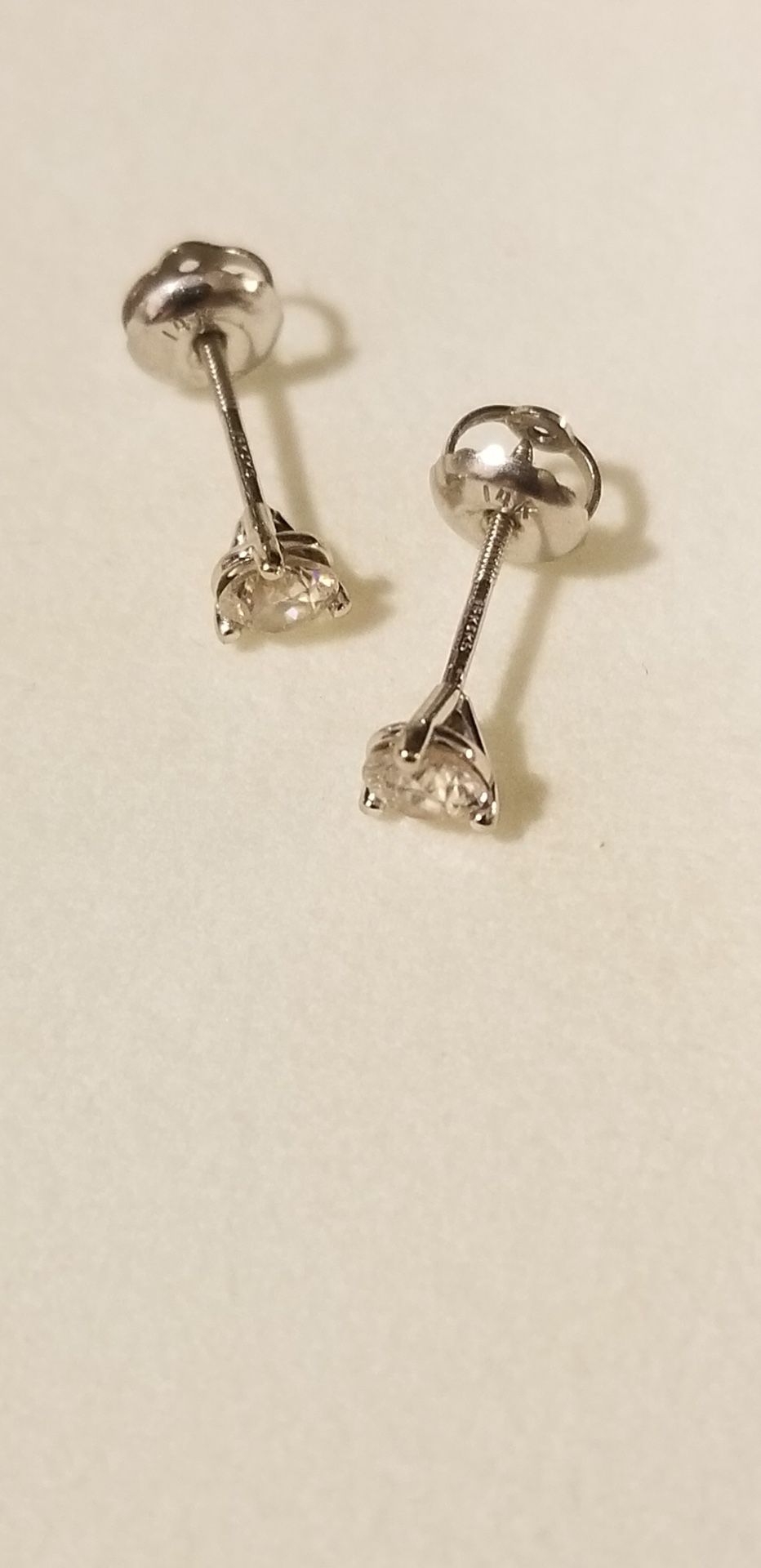 1/2 ct. tw. Diamond stud earrings