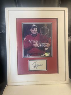 Mike Scioscia managed the Anaheim Angels to their first and only World Series championship in 2002. Signed picture with World Series trophy
