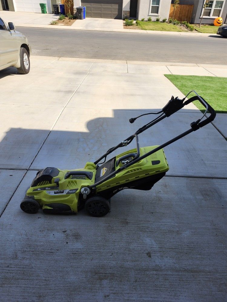 Electric Lawn Mower, Weed Eater And Hedge Trimmer