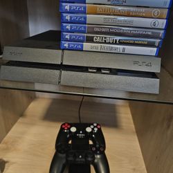 Playstation 4 With Games And Controllers