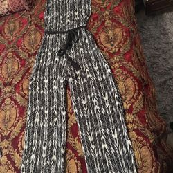 black sleeveless jumpsuit / romper with belt