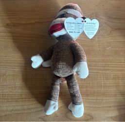 Socks the Sock Monkey, a classic brown plush toy released by Ty.