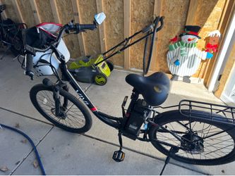 26”step thru vivi Ebike  has carrier rack and front basket goes 20