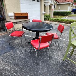 32-in Round Black Table With Red Kitchen Chairs