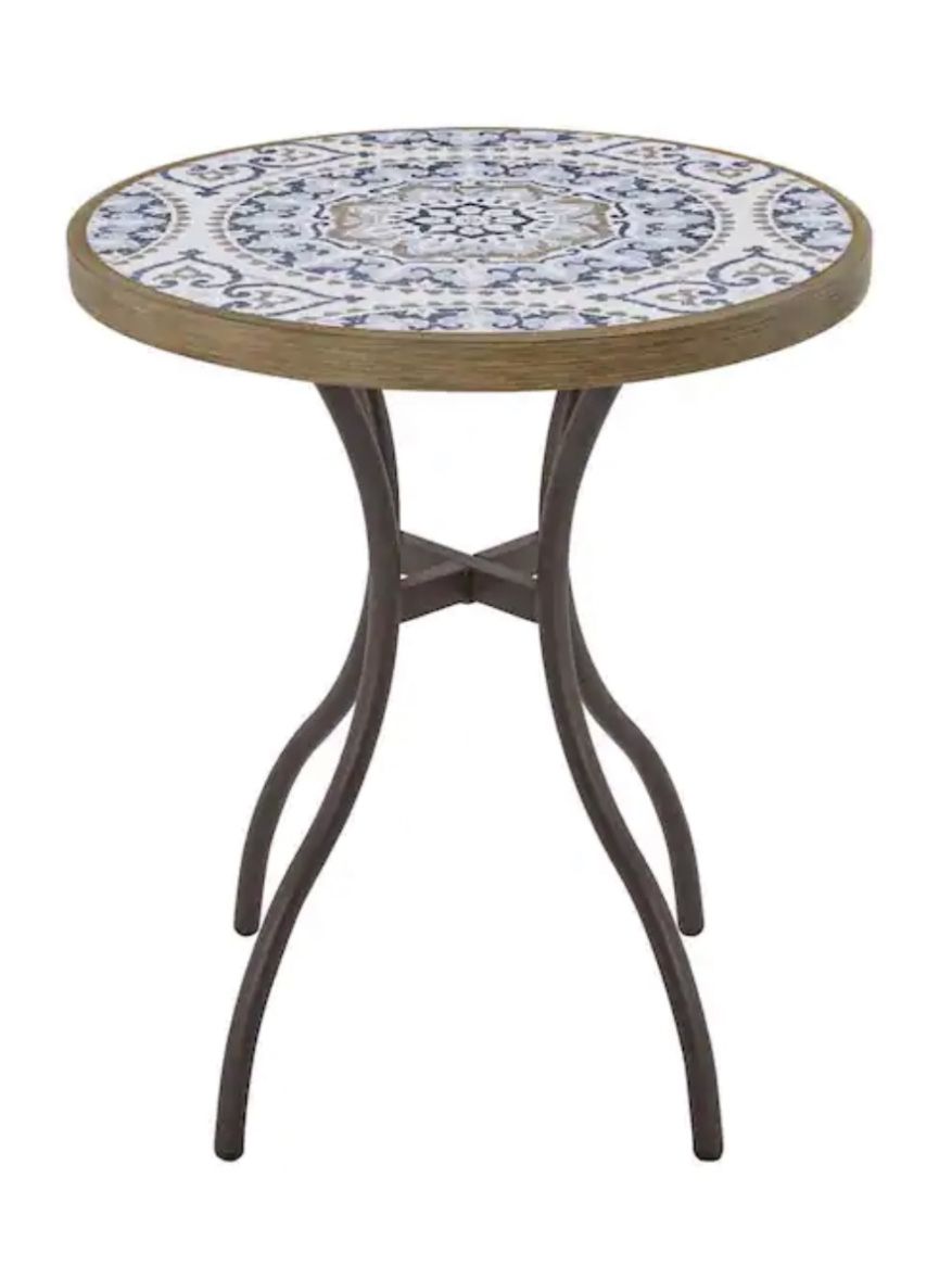 BRAND NEW OUTDOOR CERAMIC BISTRO TABLE W/ BROWN METAL LEGS. OLENTANGY RIVER RD AND BETHEL RD PICKUP.