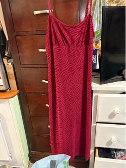 L.     Woman’s size Medium long maroon dress