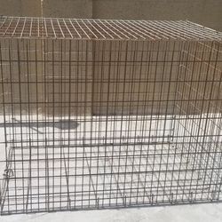 Lg.(Animal Cage) 4ft.Long, 3 ft.high, 30in.Wide.has 2 Locks on gate.