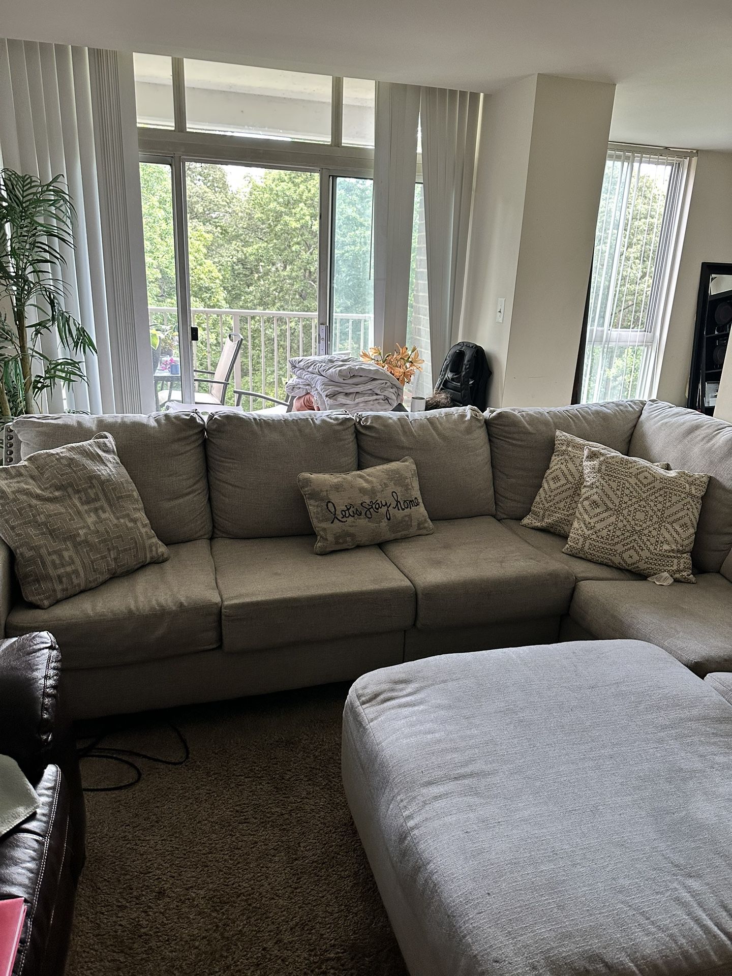 Grey sectional With Ottoman
