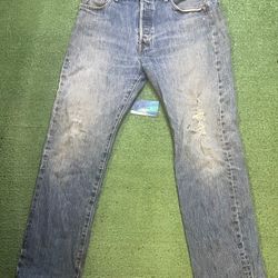 Levi’s 501 distressed jeans