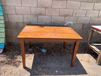 Free tables and wood surfboard