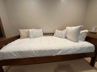 Twin bed with a free mattress