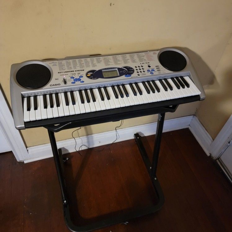 Casio LK 43 Key Lighting Keyboard 61 Keys With Stand On Wheels